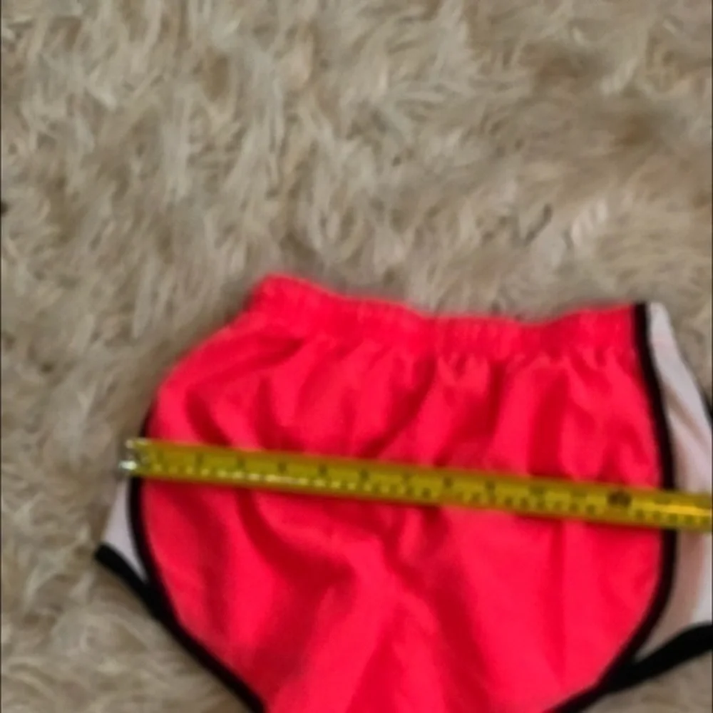 Nike pink running shorts sz med